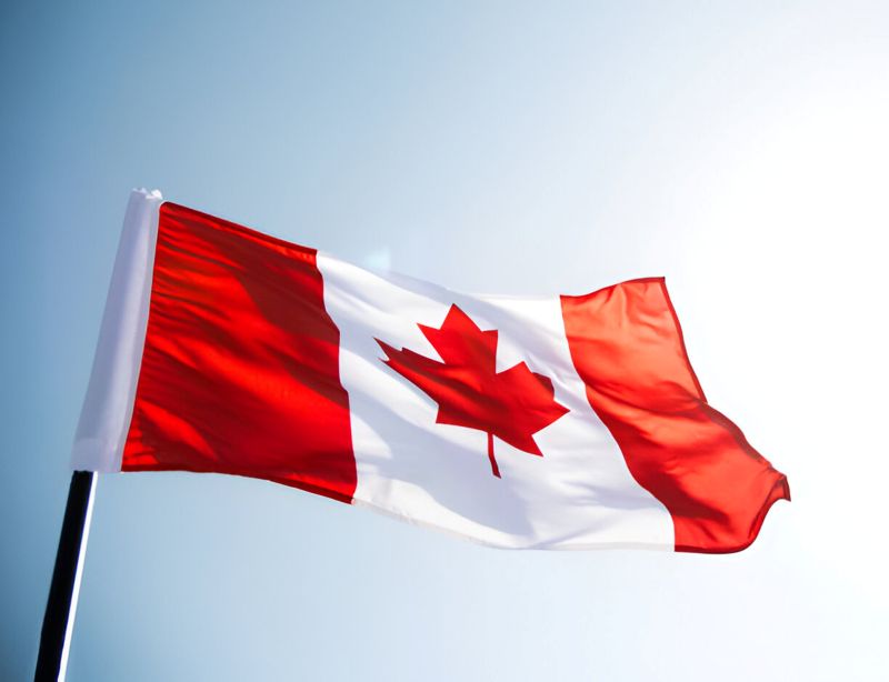 Canadian flag flying pictured