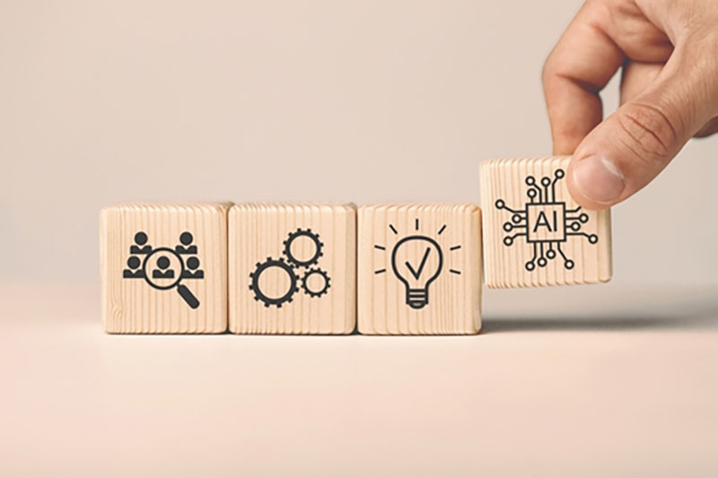 wooden blocks with AI-related icons