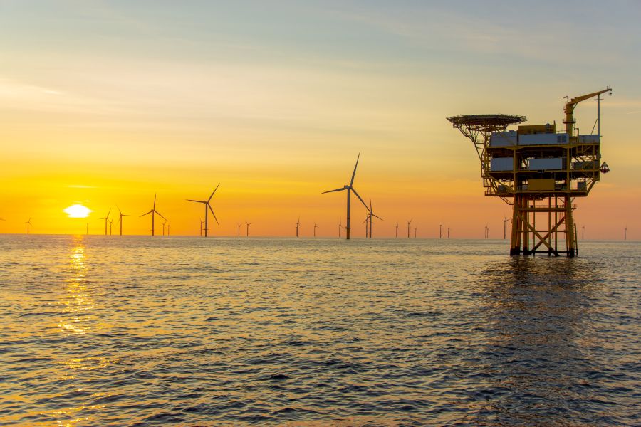 Sunset in the North Sea over an offshore wind farm