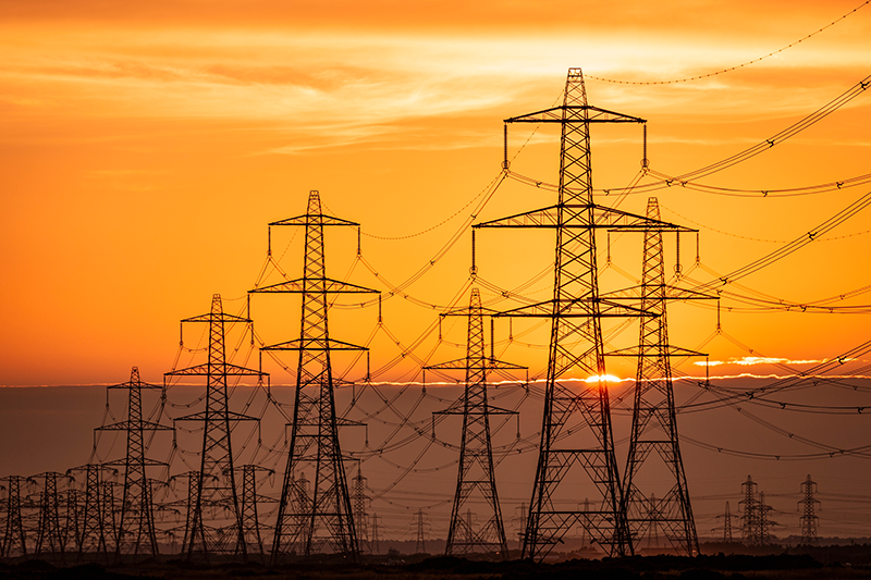 Stock image of power lines running from Dungeness power station on the Kent coast