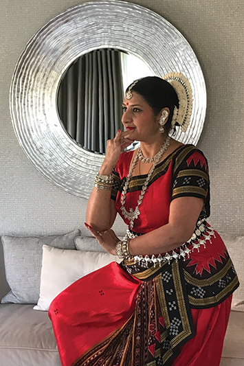 Professor Ipsita Roy in traditional Indian dance clothing, just before a Women in STEM performance