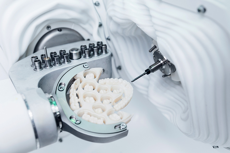 High-precision CNC machine crafting dental prosthesis for advanced dentistry solutions