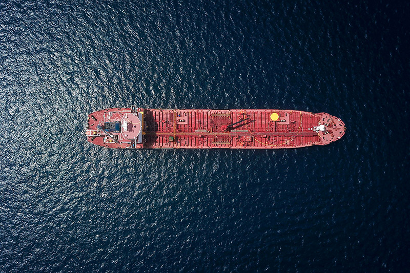 A birds-eye shot of an oil tanker at sea
