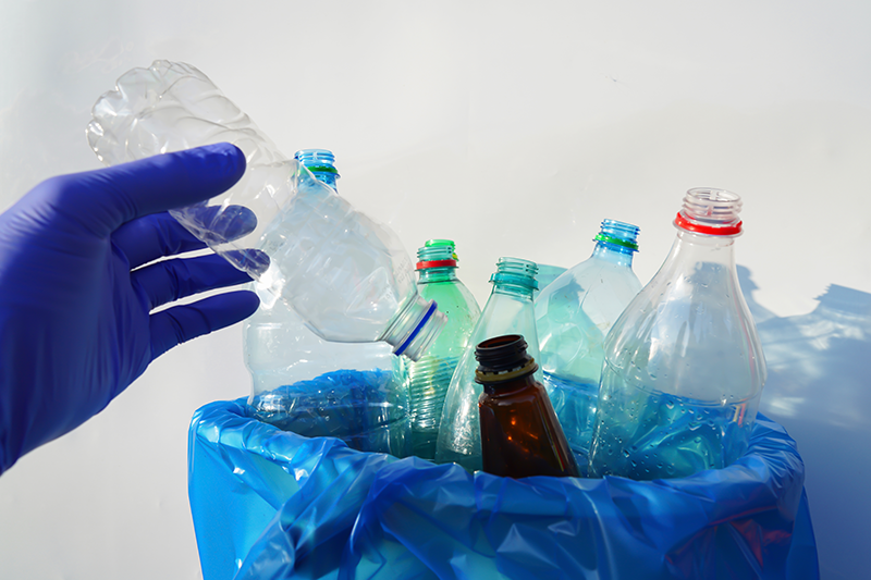 Stock image of several plastic bottles in a bin