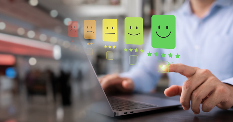 Customer giving satisfaction rating on digital interface
