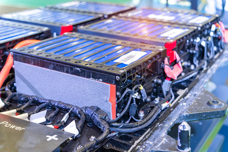 Electric car lithium battery pack and wiring connections internal between cells on background