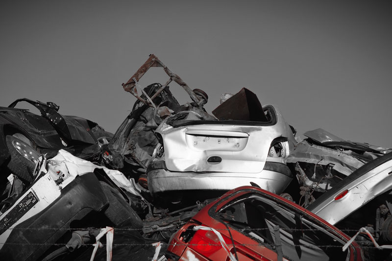 Crushed cars in a pile