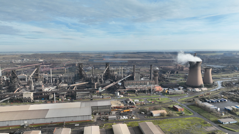 steel plant with blast furnaces, cooling towers, coking oven and roadways