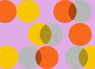 lilac background with overlapping circles scattered accross, the circles are grey, orange and yellow