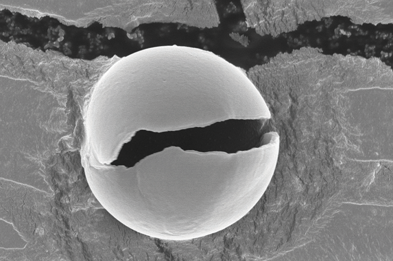 Micrograph of a bio-derived monomer becoming a polymer capsule