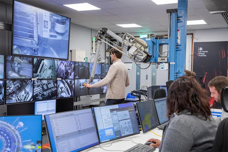 contril room with people at screens