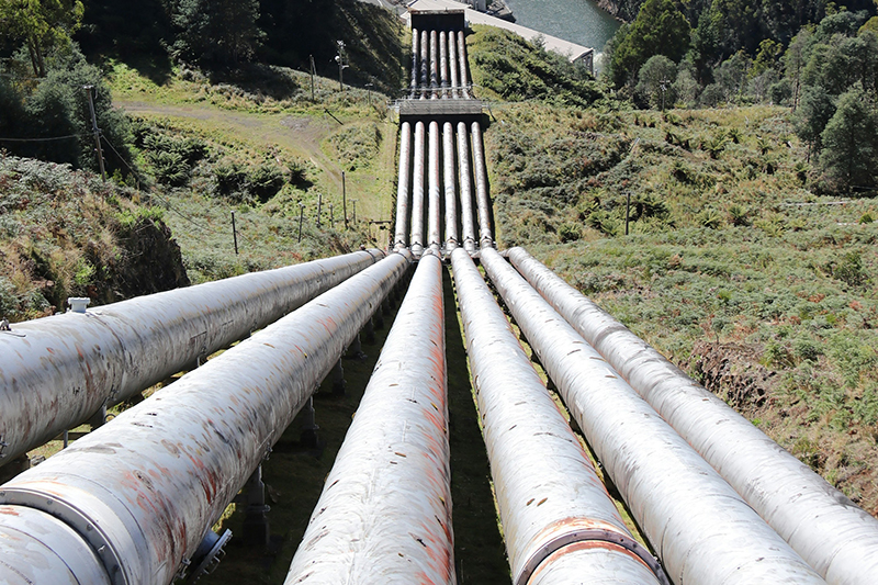 Hydro-electricity piplines above Tarraleah Power Station, Tarraleah, Tasmania. Pipelines running down a mountain