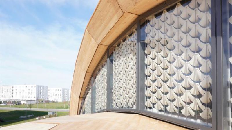 Wood and metal section of a building