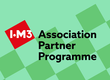 green background with darker green squares on a diagonal, single red square with IOM3 logo and text reading Association Partner Programme