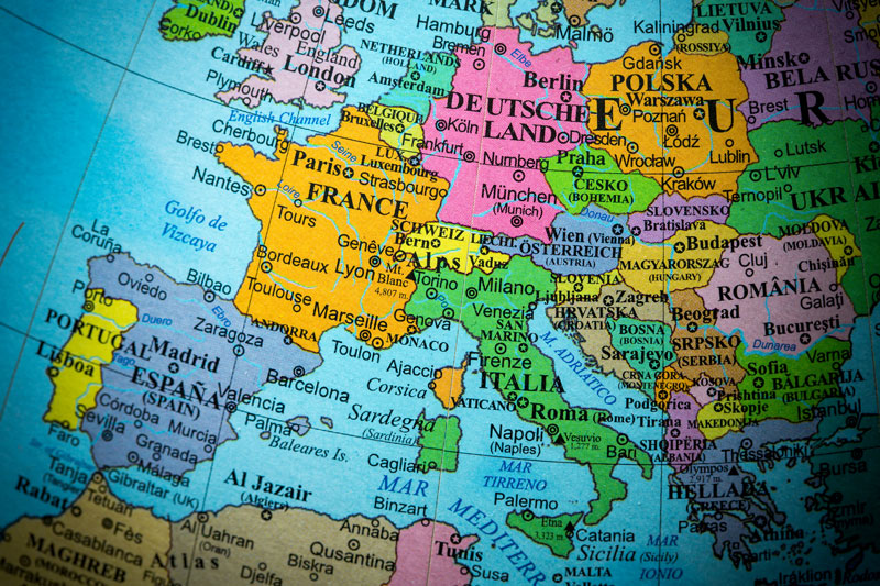 close up shot of a globe showing Europe at the centre reaching as far as the lower half of the UK, part of Portugal, Belarus and Romania