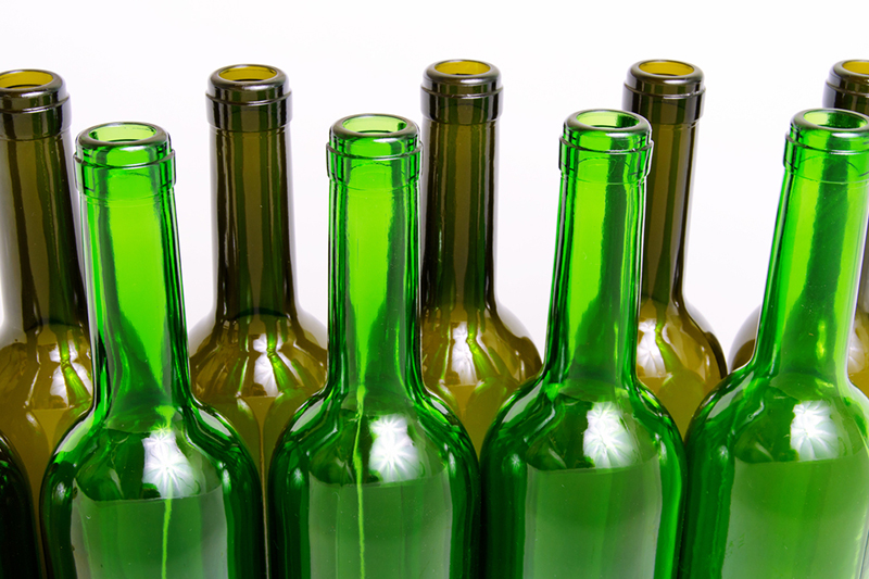 Brown and green glass bottles