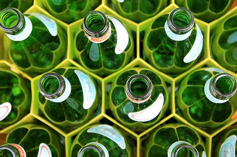 glass bottles in a wine rack