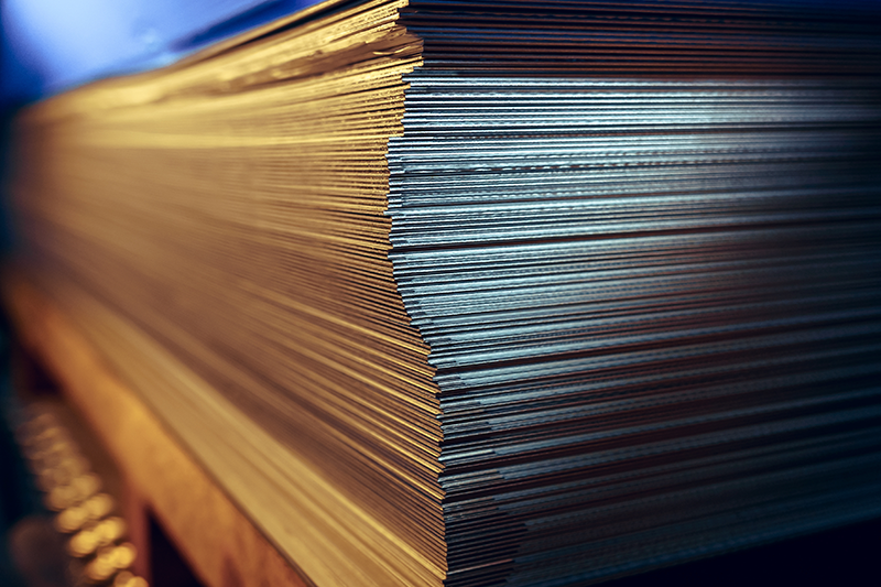 Stock image of sheet metal in warm lighting