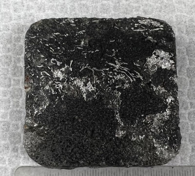 A composite tile made using the lower-temperature sintering process pictured