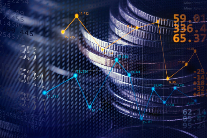  Image of coin stacks on technology financial graph background.